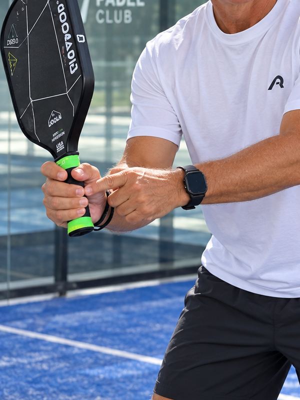 Coach Henry pointing out paddle grip and hand position